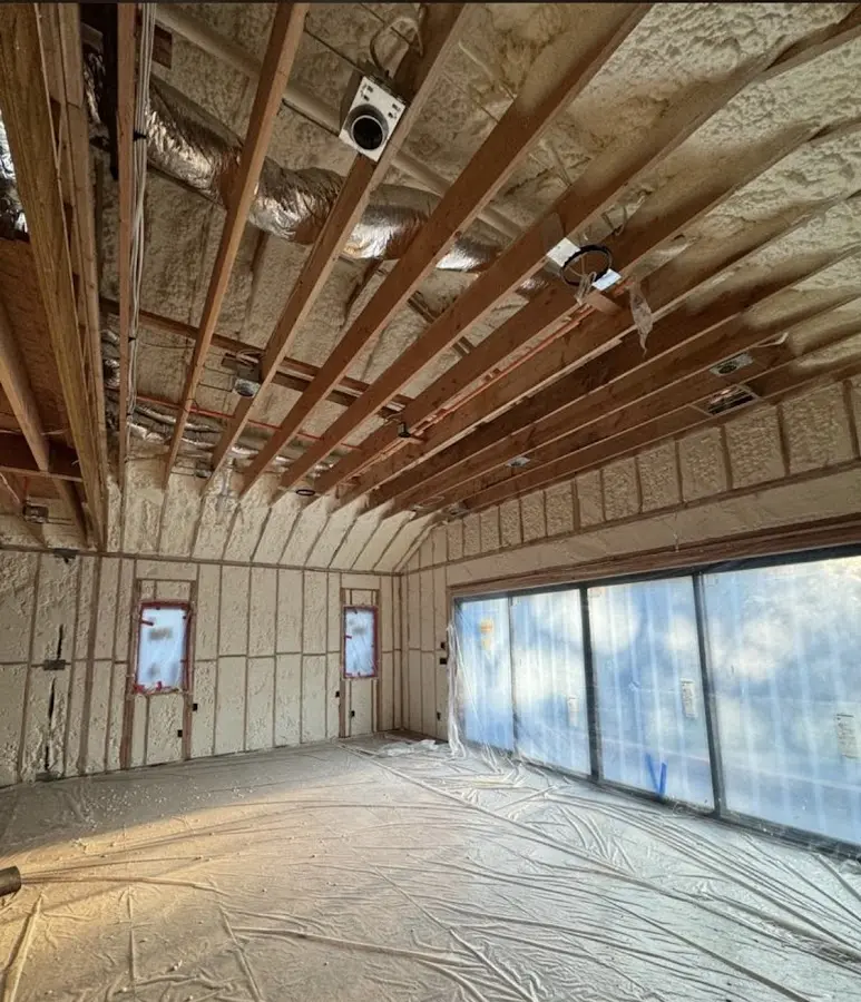 Interior walls and ceiling insulated with spray foam during new construction in Buena Park